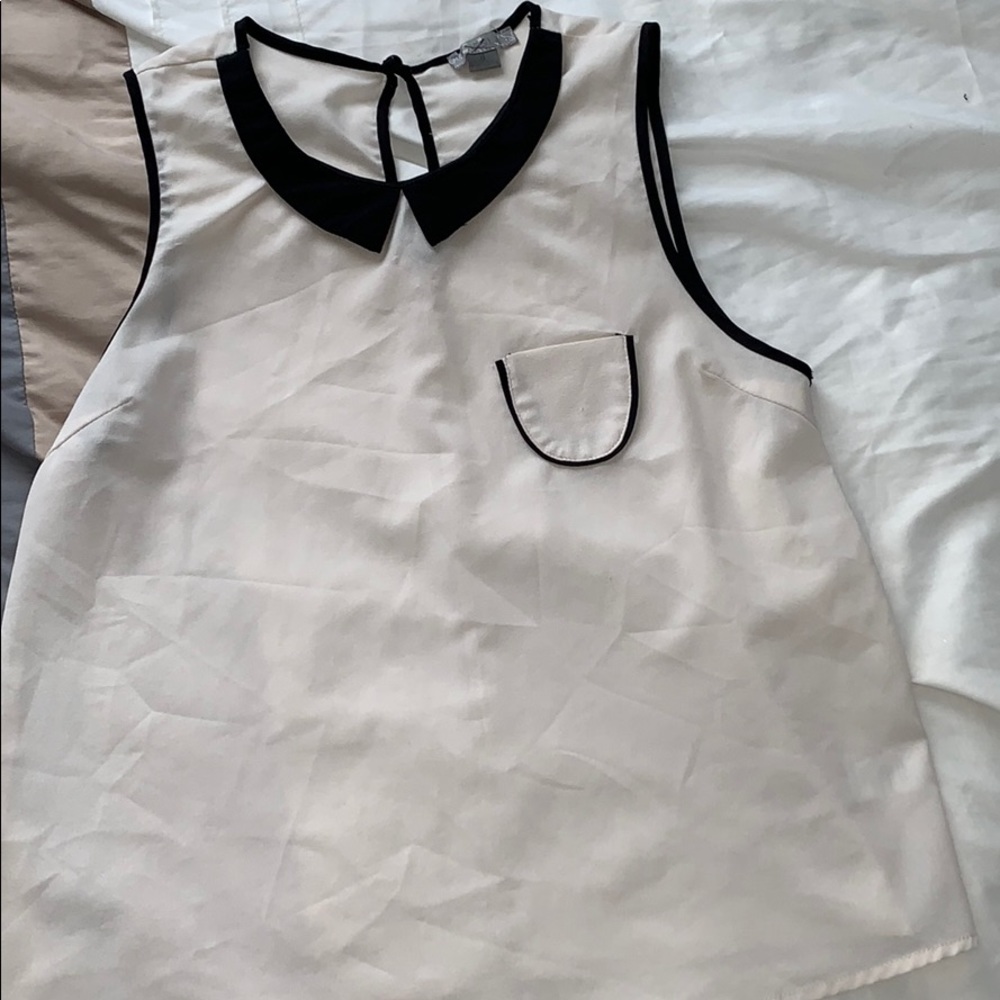 Cream and black sleeveless top